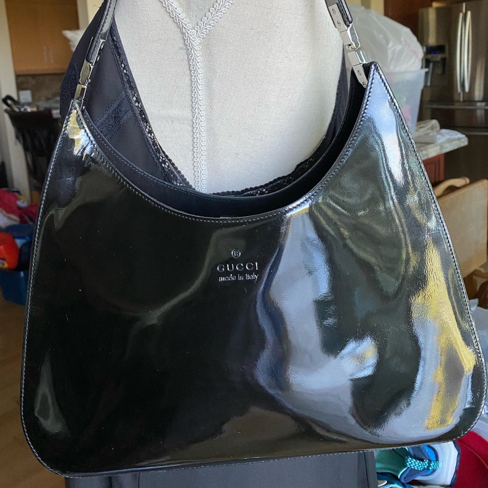 ICONIC TOM FORD FOR GUCCI - BLACK PATENT 
shoulder purse from Saks Fifth Avenue.
